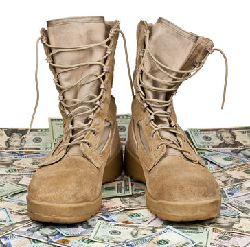 army boots on background of money