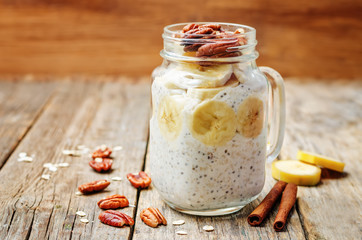 homemade healthy Chia seeds banana pecan overnight oatmeal in ja