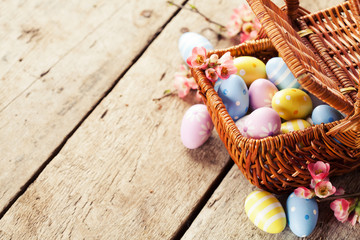 Easter decoration: colorful eggs in basket
