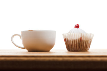 Cup of Coffee and muffin isolated on white