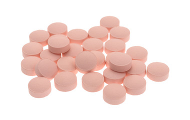 Famotidine pink tablets group on a white background
