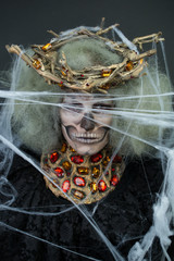  girl in the image of a skeleton on a black background