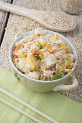 Rice with vegetables on white background