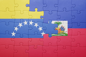 puzzle with the national flag of haiti and venezuela