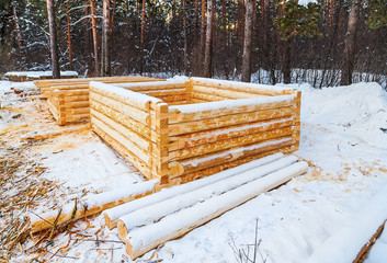 building the house from logs initial stage of the winter forest