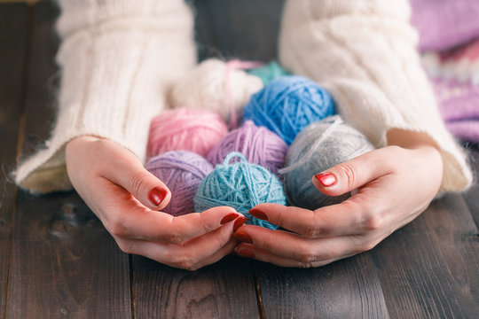 yarn for knitting in the hands of women