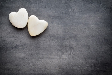 White heart on the gray background.