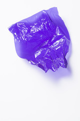 Fototapeta premium Crinkled purple sweet wrapper