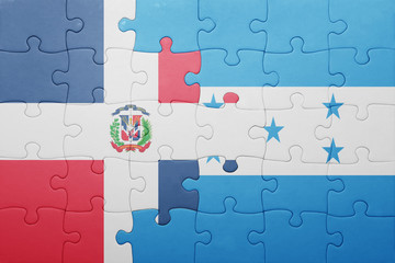 puzzle with the national flag of honduras and dominican republic