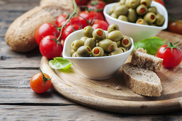 Spanish olives on the wooden table