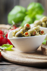 Spanish olives on the wooden table