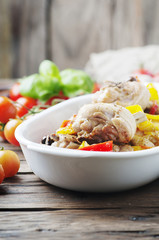 Cooked chicken with tomato, oilve and paprika