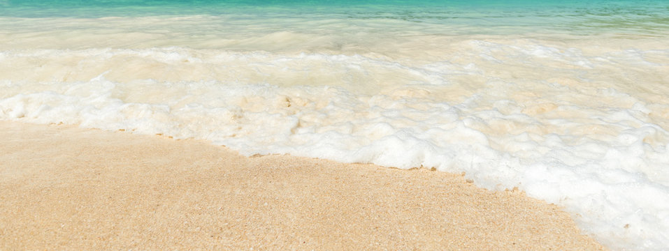 Beautiful sand beach and tropical turquoise blue sea.