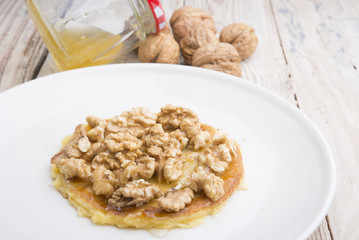 Pancakes with walnut and caramel for a breakfast