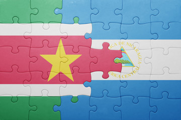 puzzle with the national flag of nicaragua and suriname