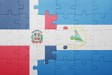 puzzle with the national flag of nicaragua and dominican republic