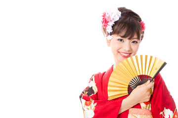 attractive asian woman wearing kimono isolated on white background