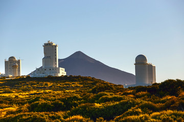 Telescopes of the Astronomical Observatory Izana with Volcano El Teide in the background, Spain