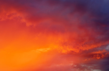 Naklejka na ściany i meble Fiery colorful sunset sky. Beautiful sky.