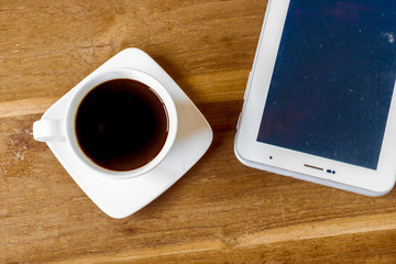 Fototapeta na wymiar coffee and tablet, workplace businessman