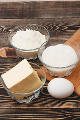 Ingredients for cooking baking on wooden table