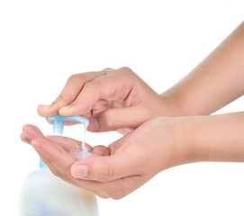 woman applying cream on hands on white background