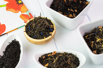 Assortment of dry tea: black, green,exotic fruit tea.
