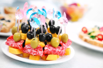 Set of cold snacks and canape, closeup