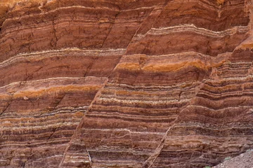 Foto op Canvas Fault lines and colorful layers in sandstone © desertsolitaire