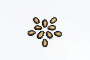 Watermelon seeds on white background