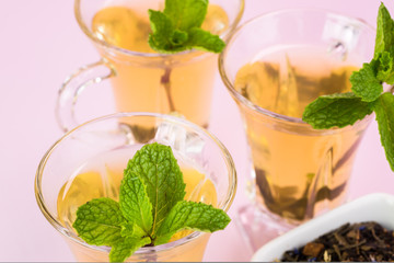 Glass tea cups with green tea.