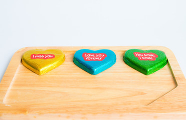 Obraz na płótnie Canvas Chocolate wrapper on Valentine's Day,colorful chocolate heart