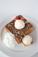 Fresh Toast with chocolate spread on a white plate with icescrea