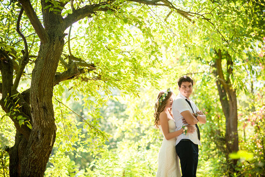 Bride and groom in the park
