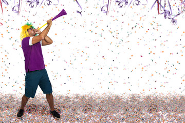 Brazilian guy blowing a horn at Carnival