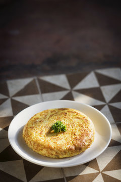 spanish tortilla traditional omelet on rustic tiles