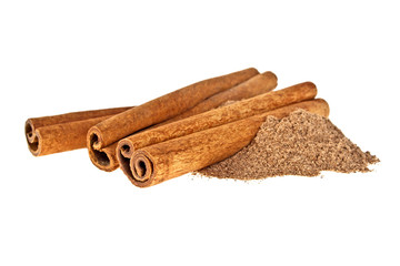 Cinnamon sticks with powder isolated on white background