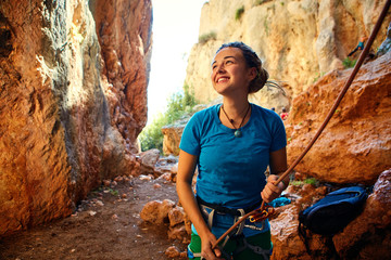 female belayer with the rope