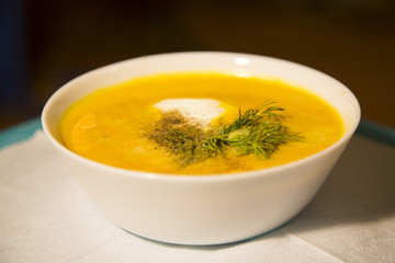 pumpkin soup puree in a white plate