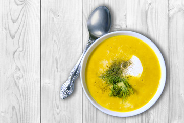 pumpkin soup puree in a white plate