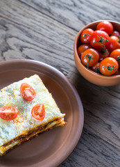 Lasagna with cherry tomatoes
