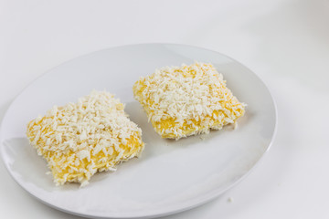 Bread on white dish.