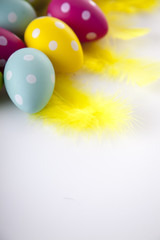 Easter chicken, eggs and decoration in vintage sytle wooden background