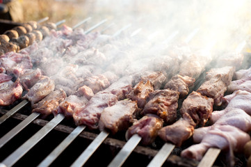 beef and pork steak bbq on the grill