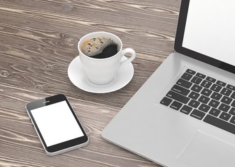 Laptop smartphone and coffee cup 