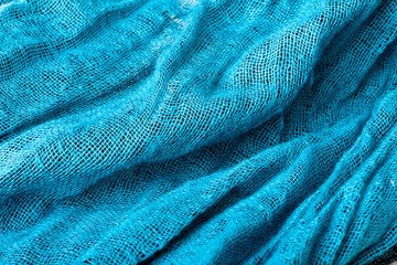 blue women's scarf close up as a texture