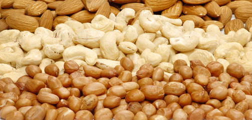 Assorted mixed nuts on white background