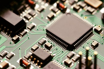 Close-up of electronic circuit board with components. Motherboard in to a PC