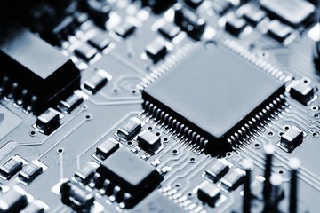 Close-up of electronic circuit board with components. Motherboard in to a PC
