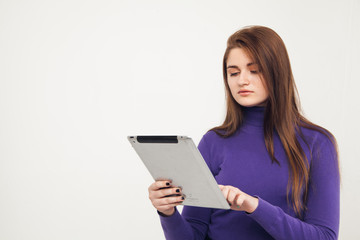Fototapeta premium Teen with tablet pc, white background